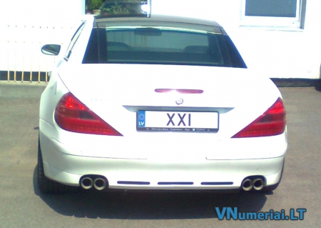 XXI